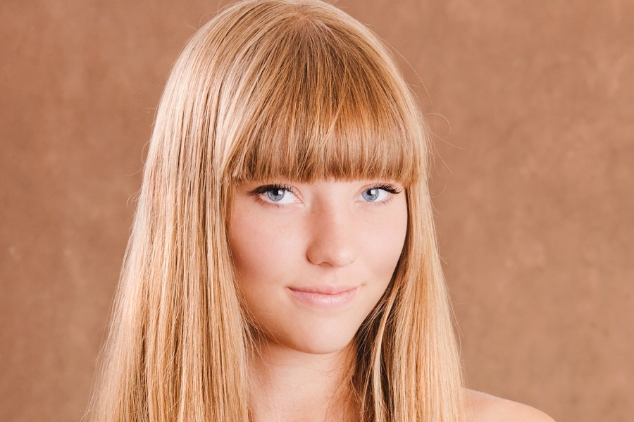 low maintenance bangs hairstyle for round face