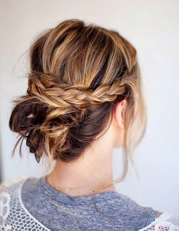 messy low bun with braid