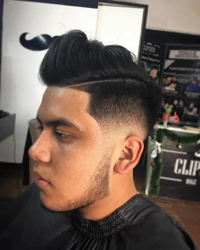 spiky hairstyle with low skin fade