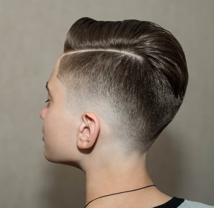 side part haircut with low skin fade