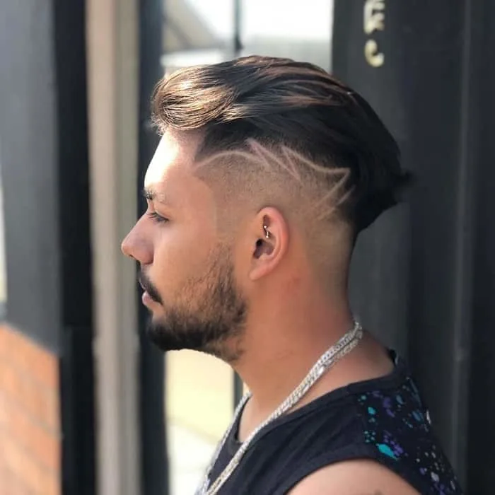 low skin fade haircut with design