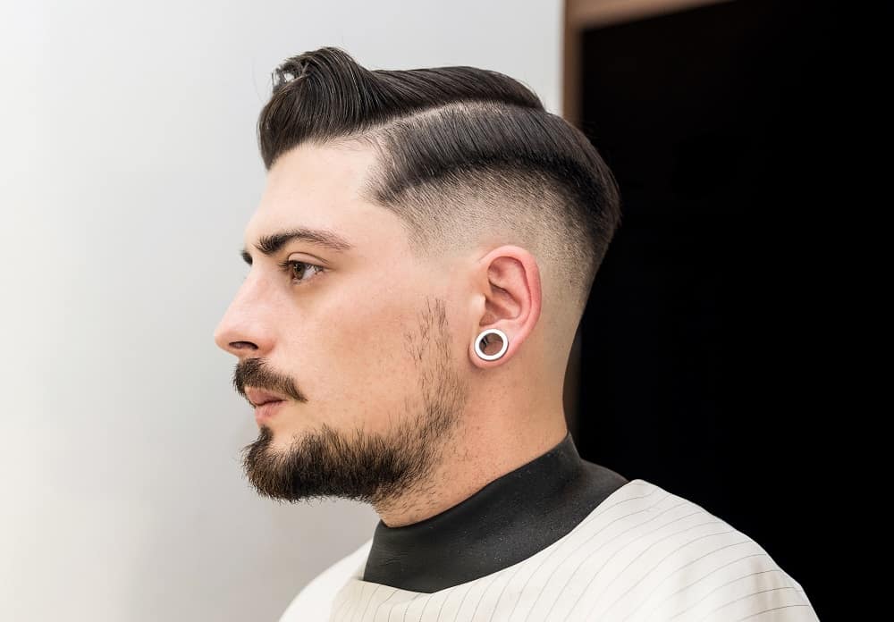 low taper fade with side part
