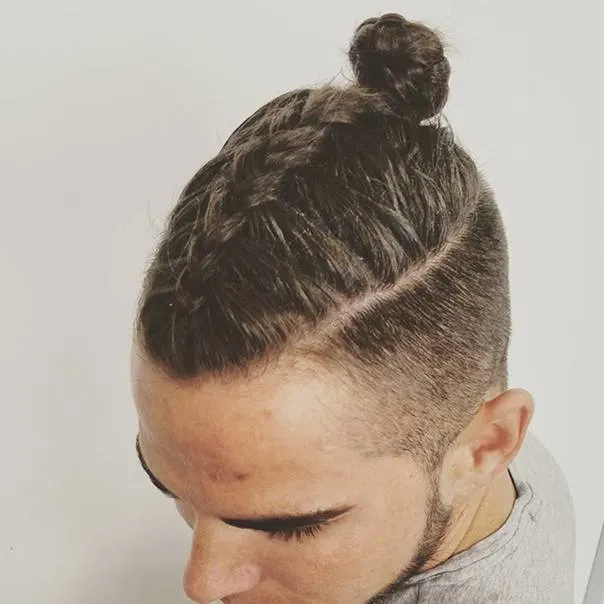 fashionable man bun braids