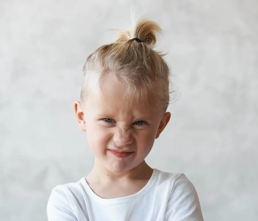 Image of Man bun hairstyle for little boys