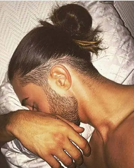 man bun with undercut for thick hair