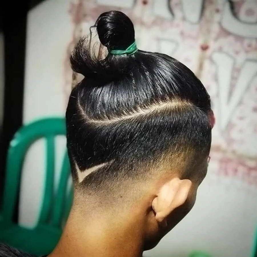 man bun undercut with design