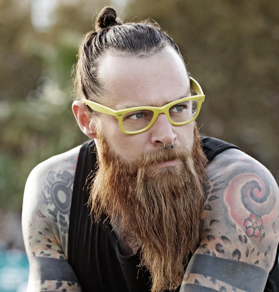 man bun with beard and glasses