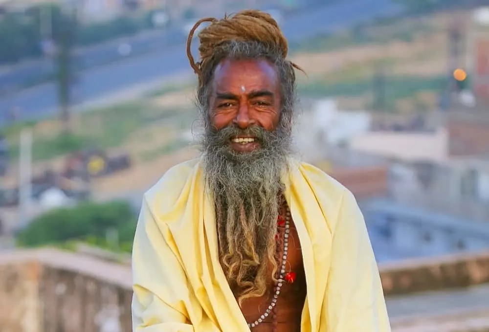 man bun with dreadlock beard