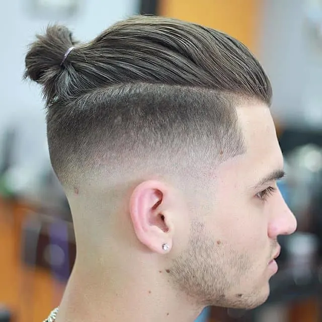 man bun with undercut and fade