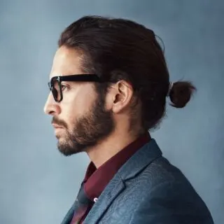 man bun with glasses