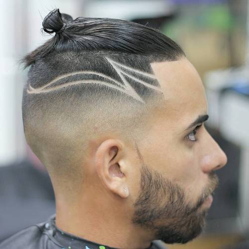 Slick Man Bun with Shaved Sides and Design
