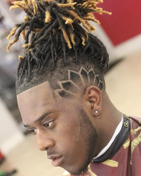 17 Suave Man Bun Hairstyles with Shaved Sides We Love