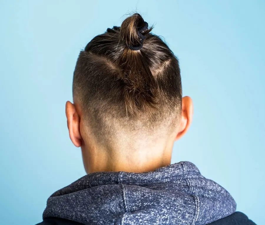 man bun with undercut fade