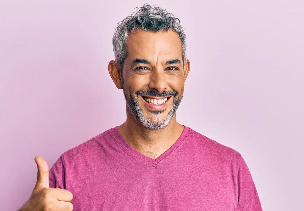 man over 50 with grey curls