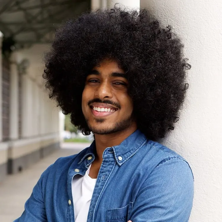 man with curly frizzy hair