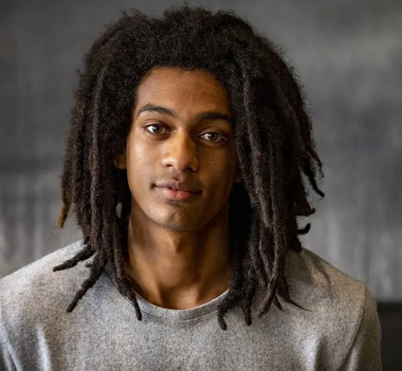 man with long layered dreadlocks