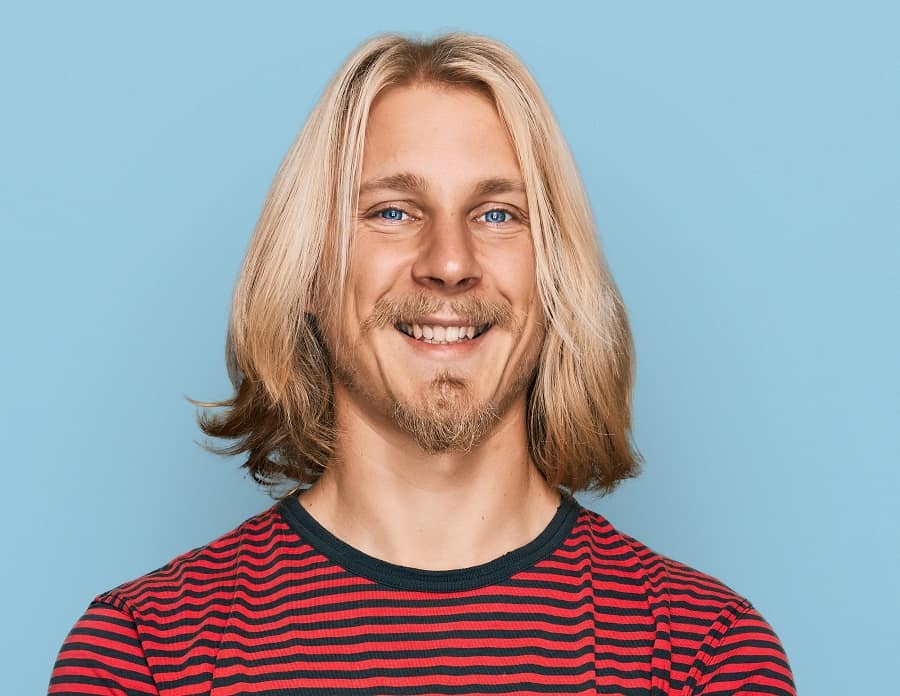 man with long straight blonde hair