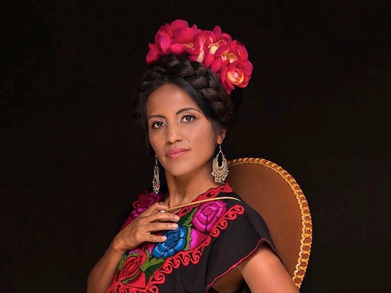 Premium Vector | A beautiful young woman in a traditional mexican dress
