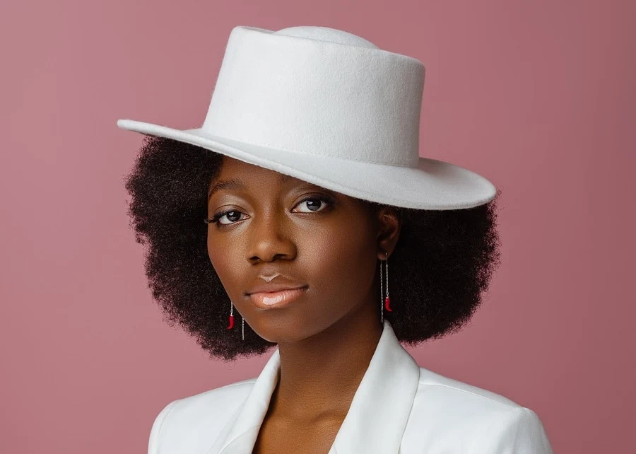medium afro hair with topper hat