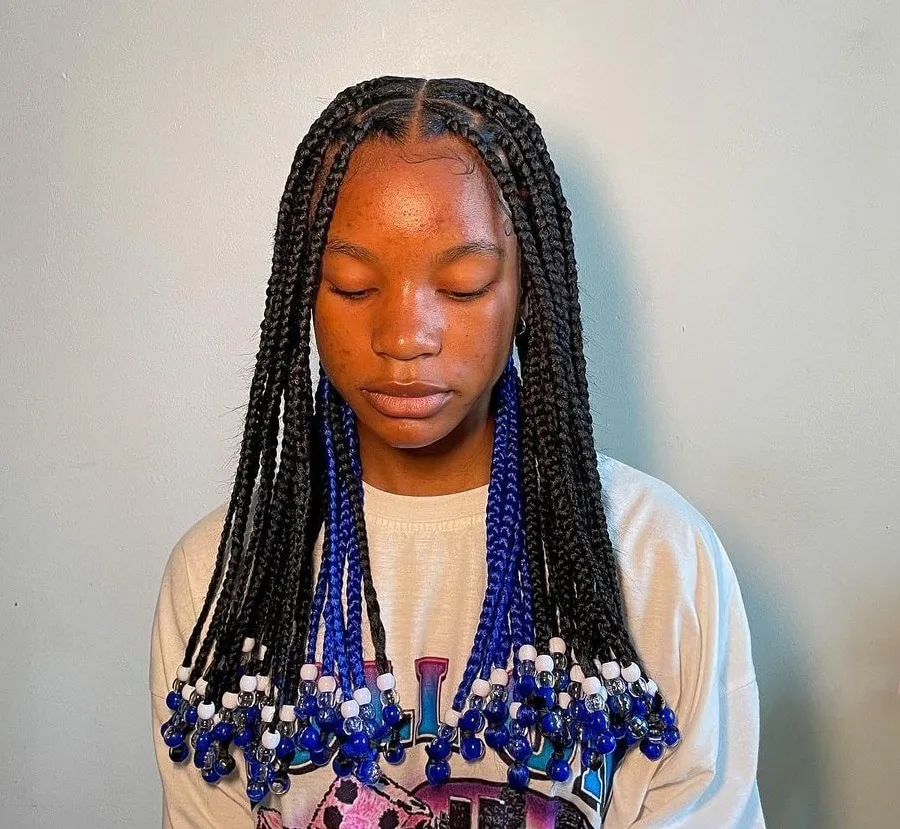medium black and blue knotless braids with beads