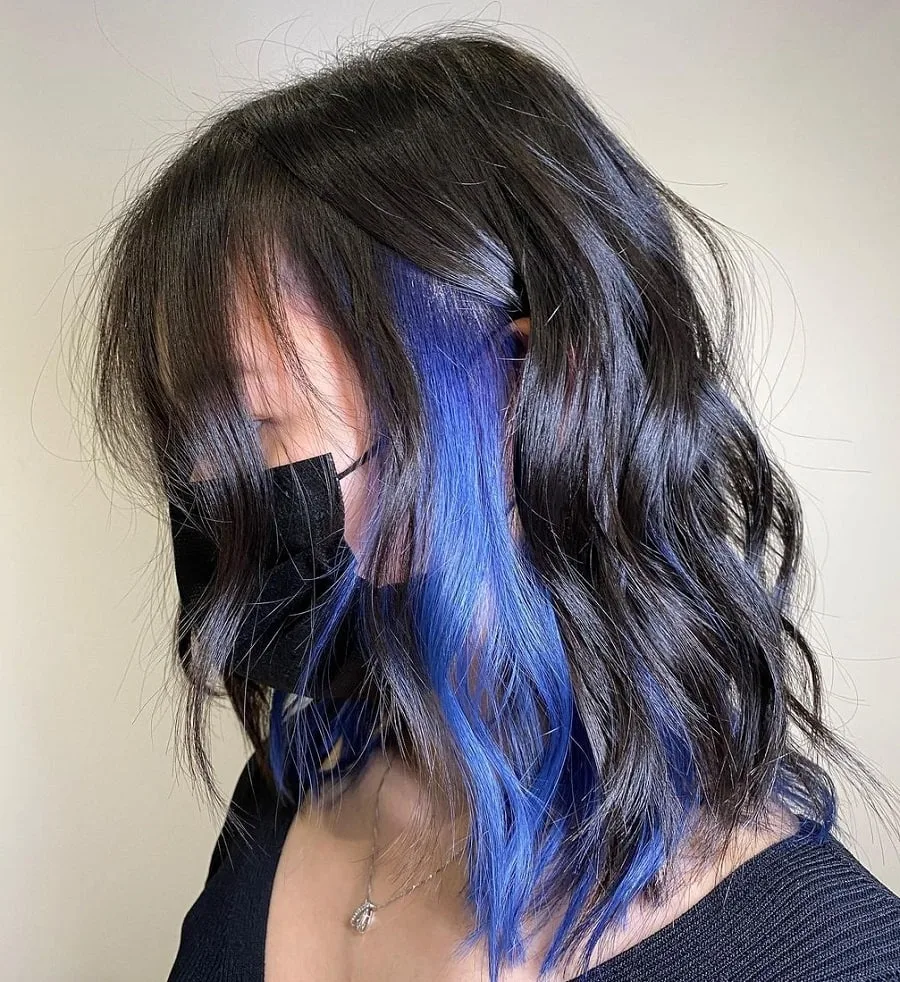 medium black wavy hair with blue underneath