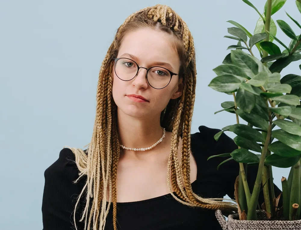 medium box braids and glasses