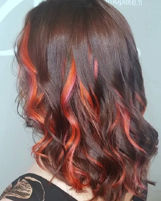 medium brown hair with orange highlights