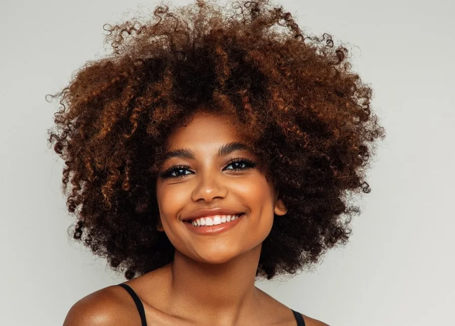 medium curly hairstyle black women with square face