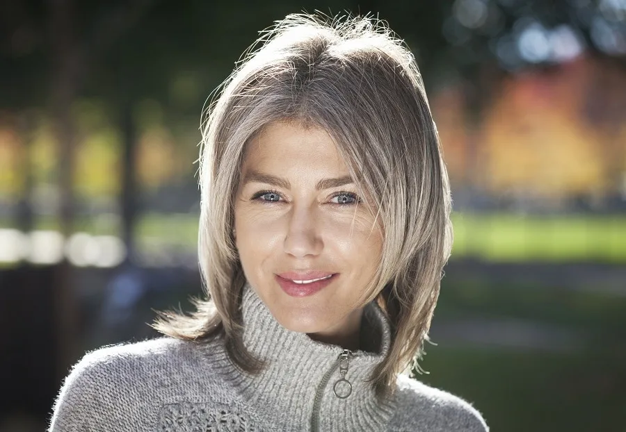 medium grey balayage hairstyle for women over 50