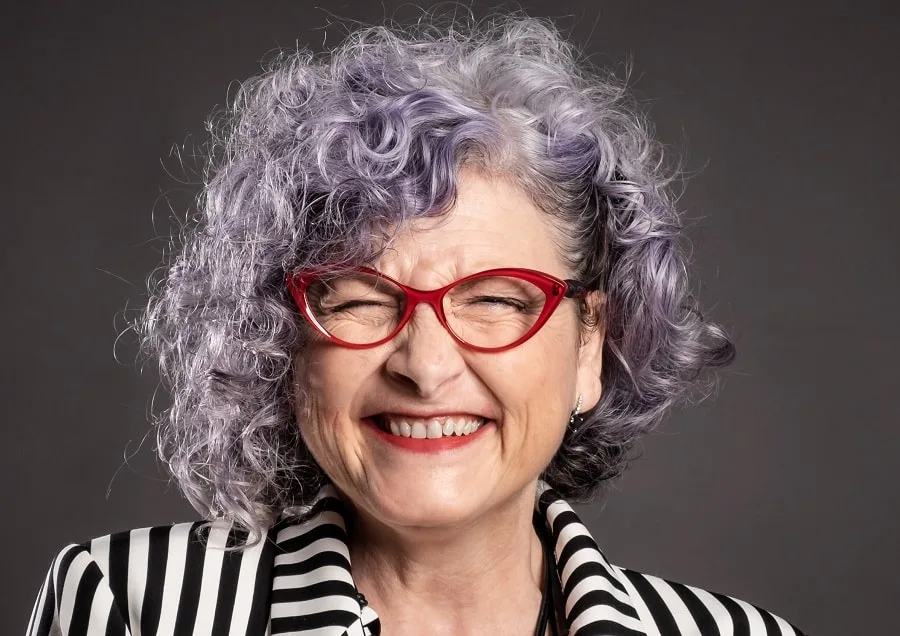 medium grey permed hairstyle for women over 60