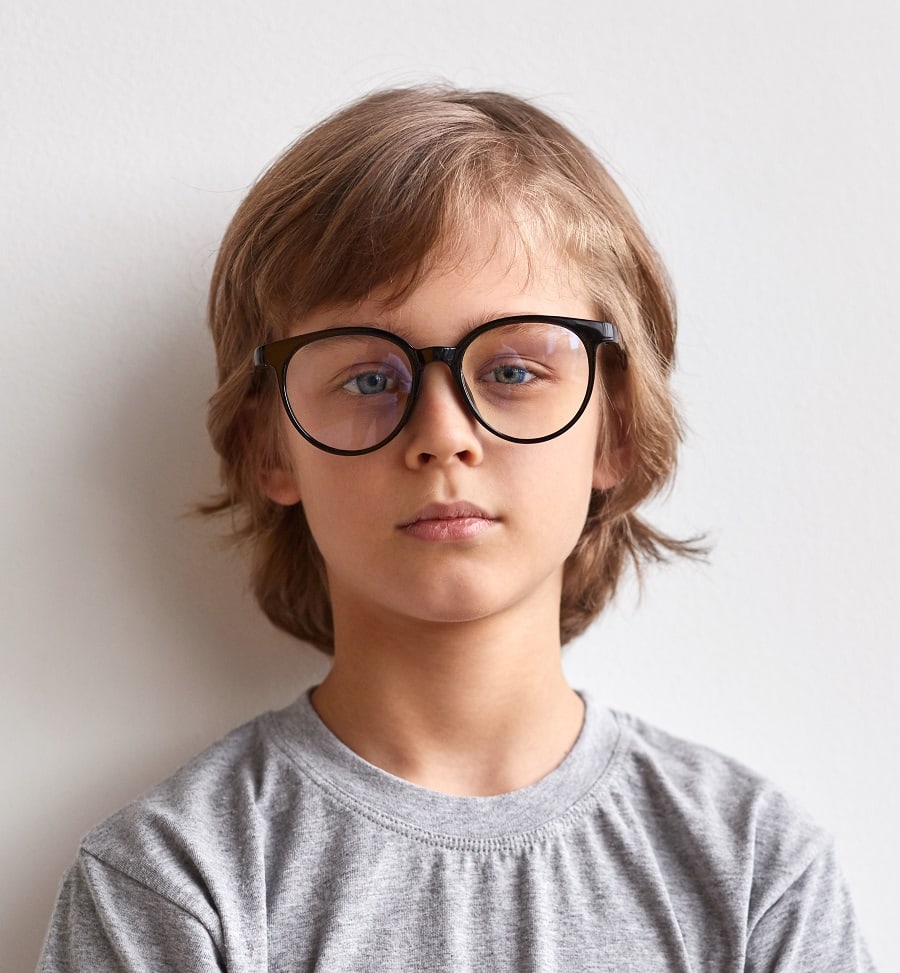 medium haircut for boys with glasses