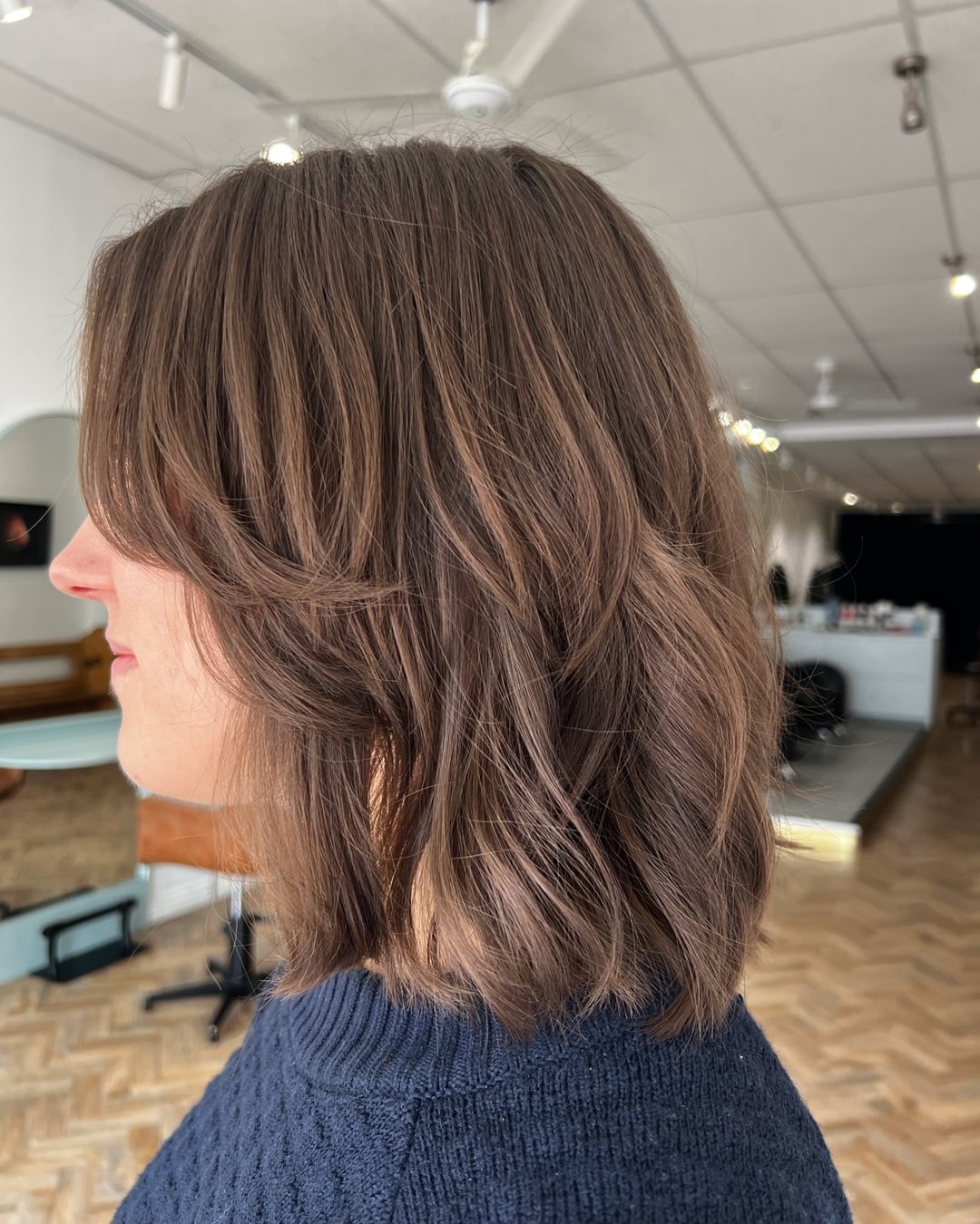 mediumnlength brown layered bob with face framing layers
