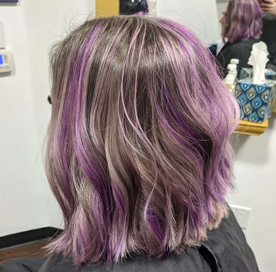 medium length dark gray hair with lavender highlights