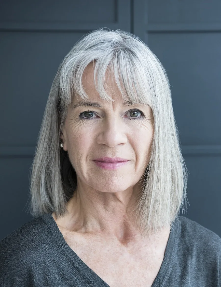 medium length grey hair with bangs