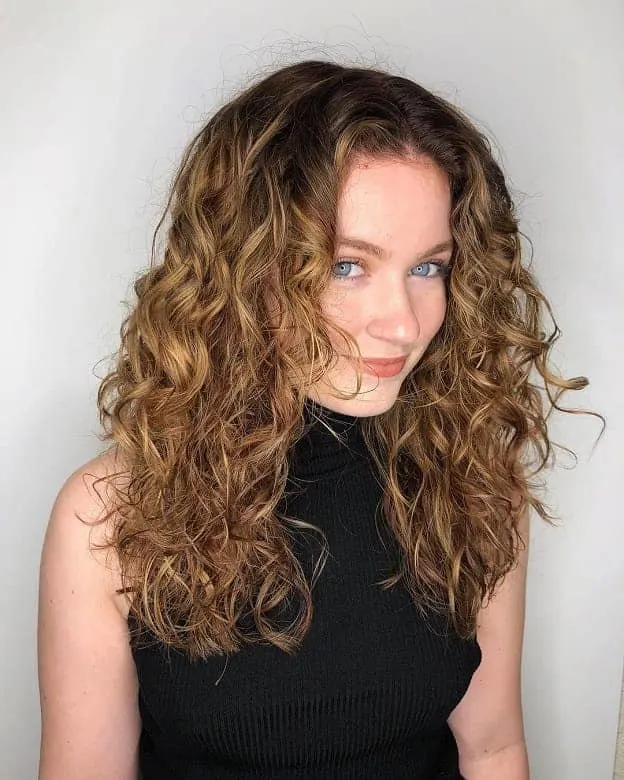 curly medium length layered hairstyle