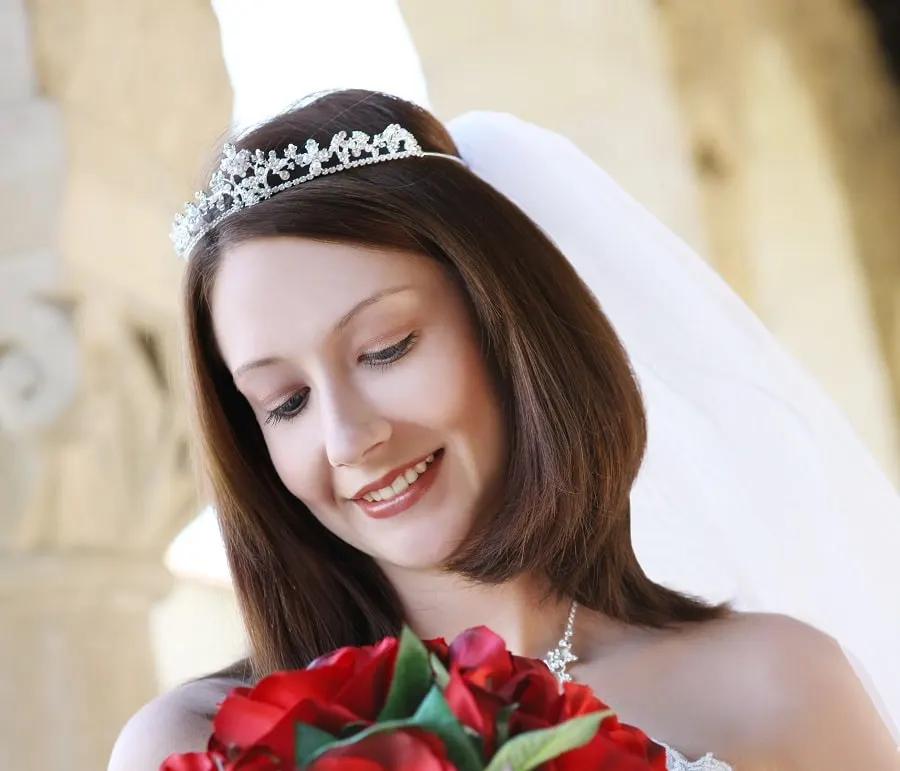 medium length wedding hairstyle with tiara and veil