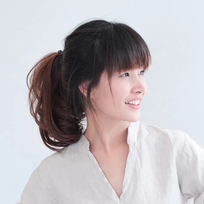 medium ponytail with bangs