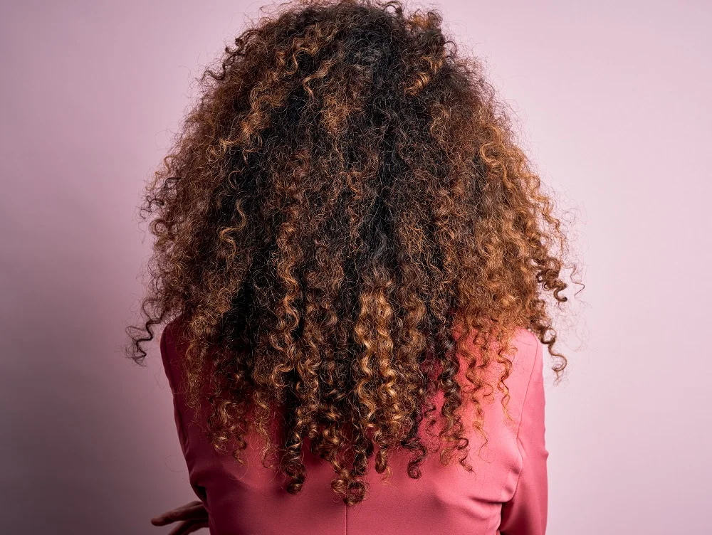 medium u shaped curls with highlights
