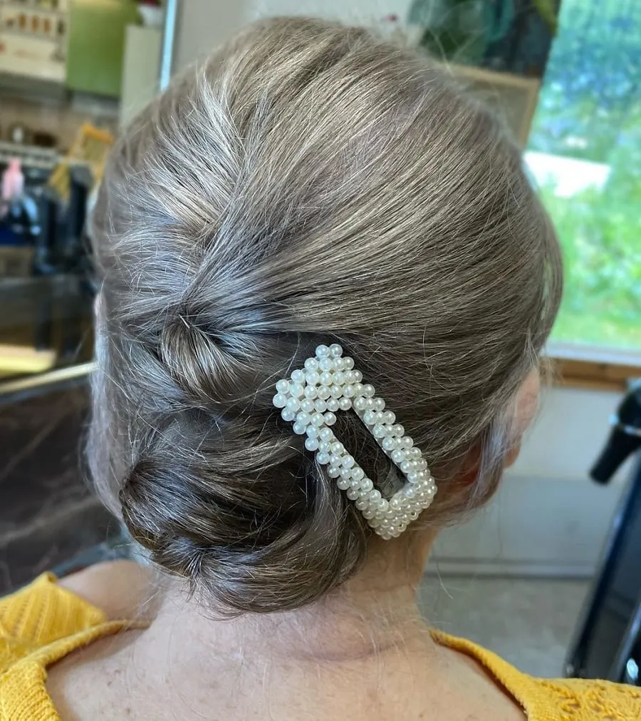 medium updo hairstyle for women over 60
