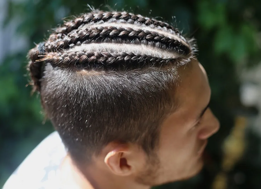 men braids with disconnected undercut