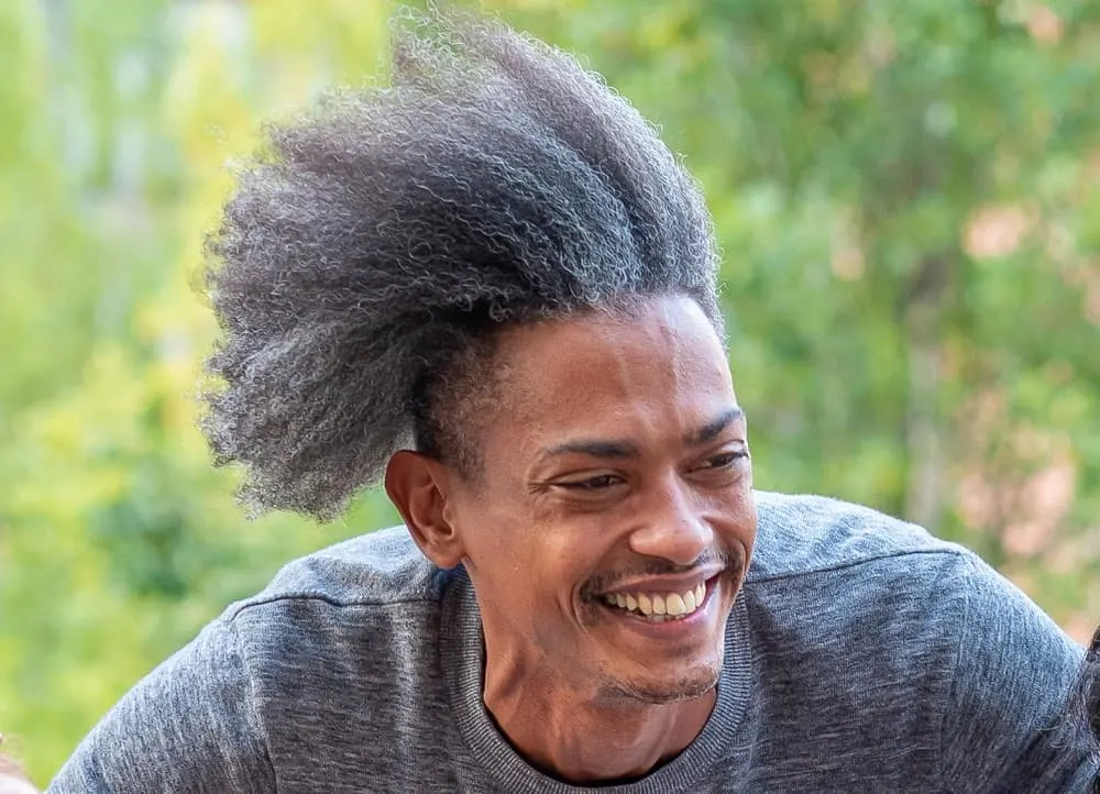 men's afro curls with undercut