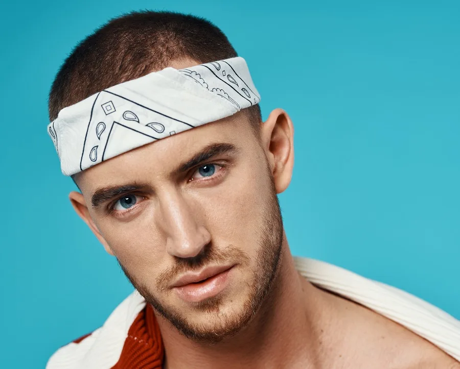 A buzz cut for men with a bandana