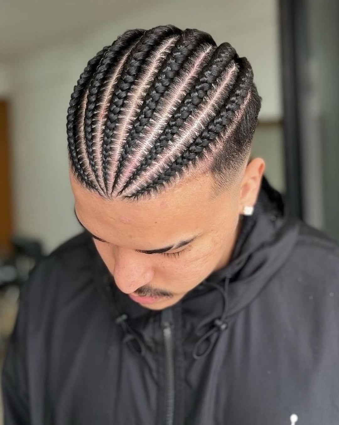 men's straight back cornrows with crisp parting and a clean temple fade