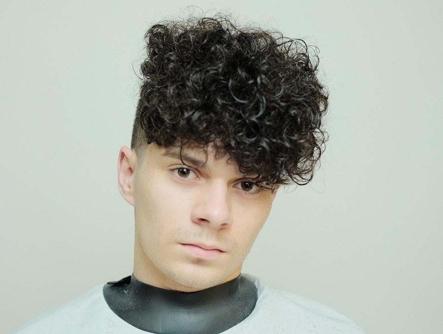 mens hairstyle with tight perm