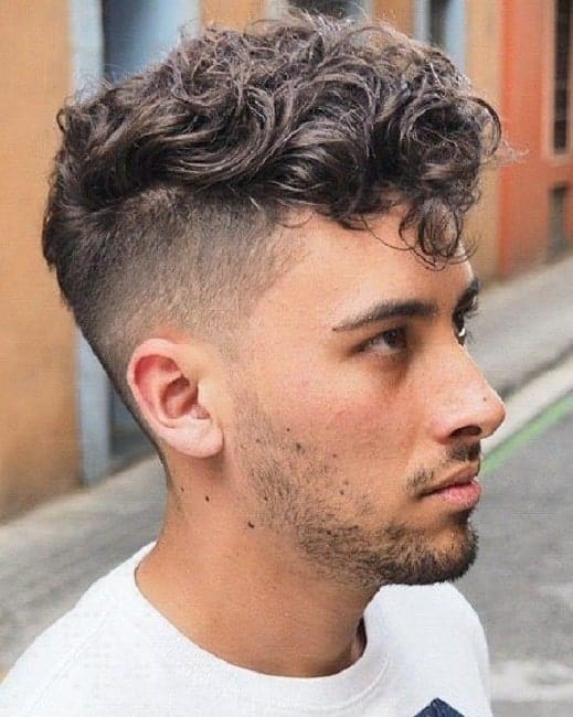 short messy curly hairstyle for men