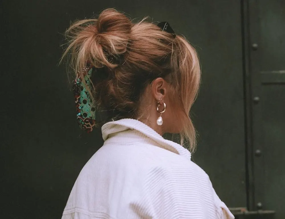 messy bun with bangs