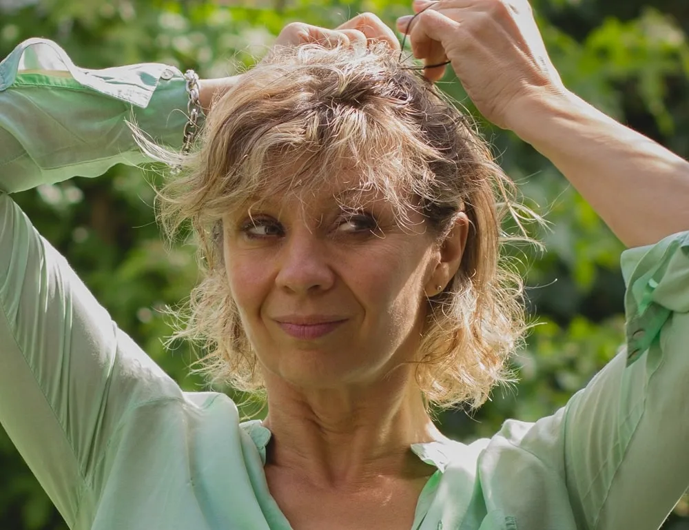 messy fine hairstyle for women over 50
