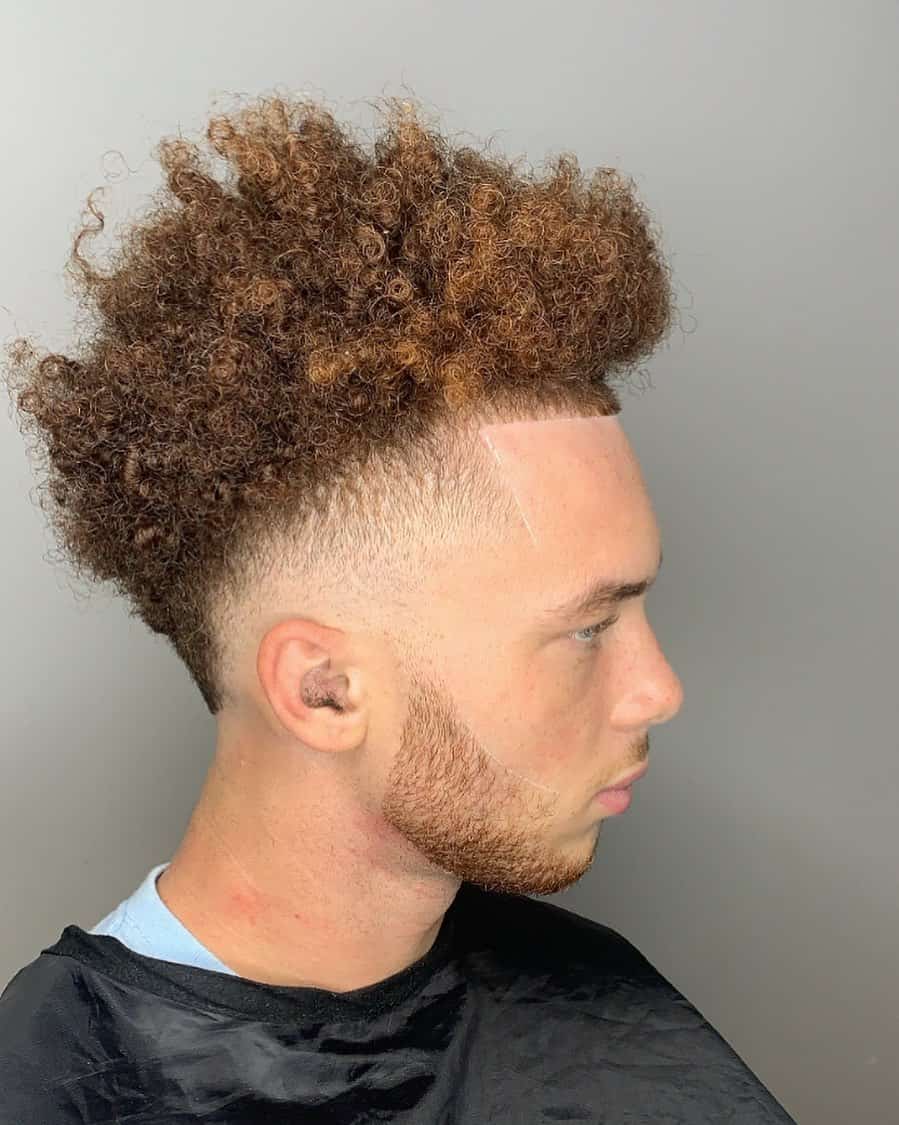 messy frohawk haircut for men