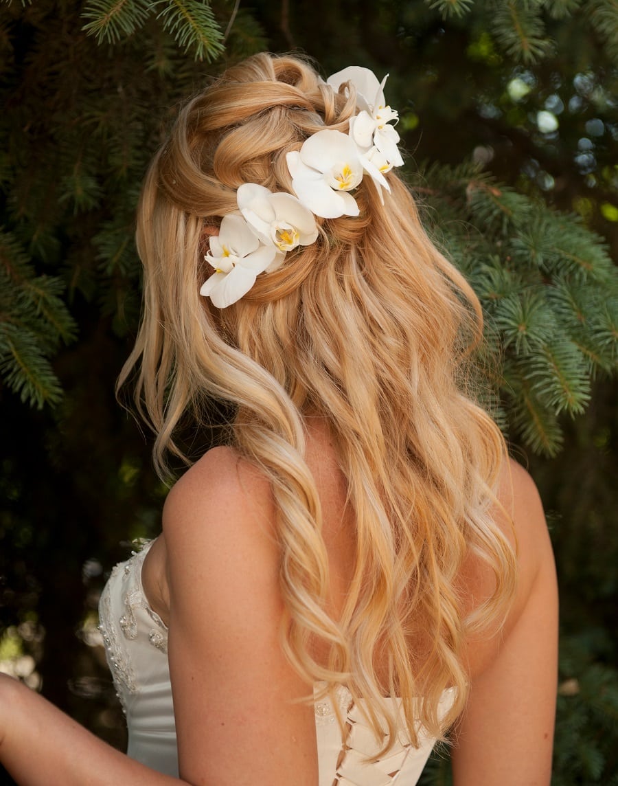 messy hairstyle with flowers for wedding
