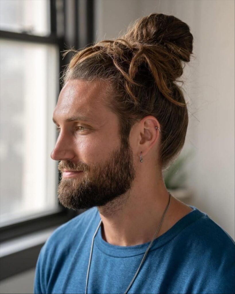 messy man bun hipster haircut